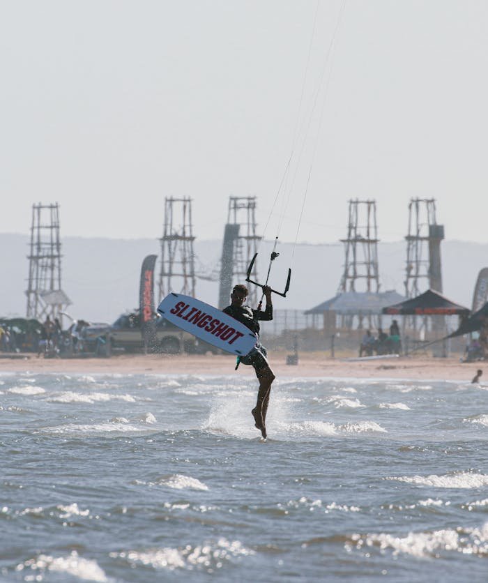 Kitesurfer enjoying a thrilling ride on Adicora beach in Venezuela.